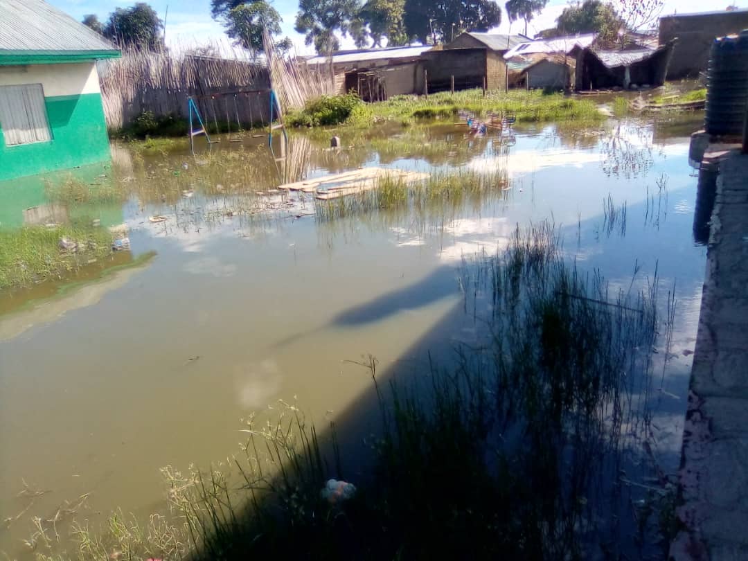 "The flooded compound of our Community School, now inaccessible to children due to rising waters."